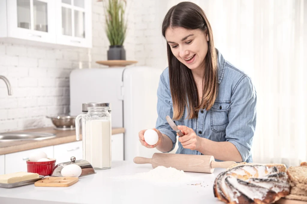 Beautiful Lady preparing a dough Using gluten-free flour