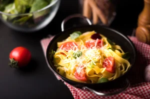 A vibrant bowl of feta tomato pasta