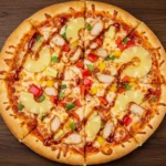 A delicious pineapple pizza topped with BBQ chicken and fresh ingredients.